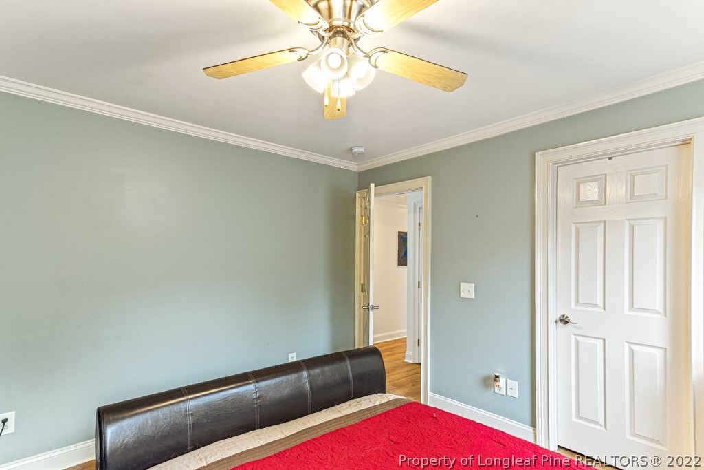 126 Falling Water Road Spring Lake, NC 28390 - Photo 43 of 47 a view of room with chandelier fan and windows