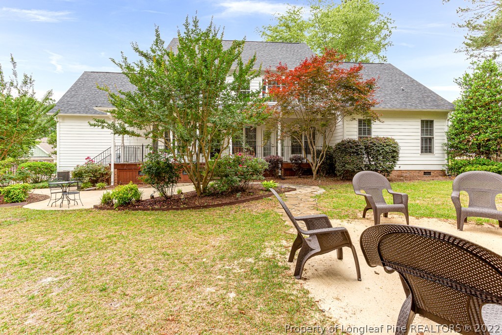 126 Falling Water Road Spring Lake, NC 28390 - Photo 7 of 47 a view of a swimming pool with outdoor seating