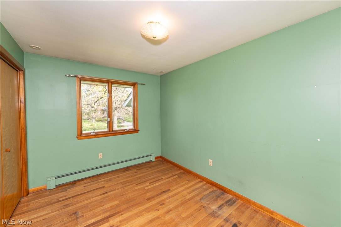 12310 Huntoon Road Painesville, OH 44077 - Photo 23 of 48 Bedroom #3 with hardwood floors