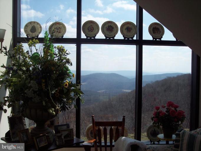 18500 Turkey Ridge Road Northeast Flintstone, MD 21530 - Photo 3 of 25 This 2 story view is in the solarium/entry room!