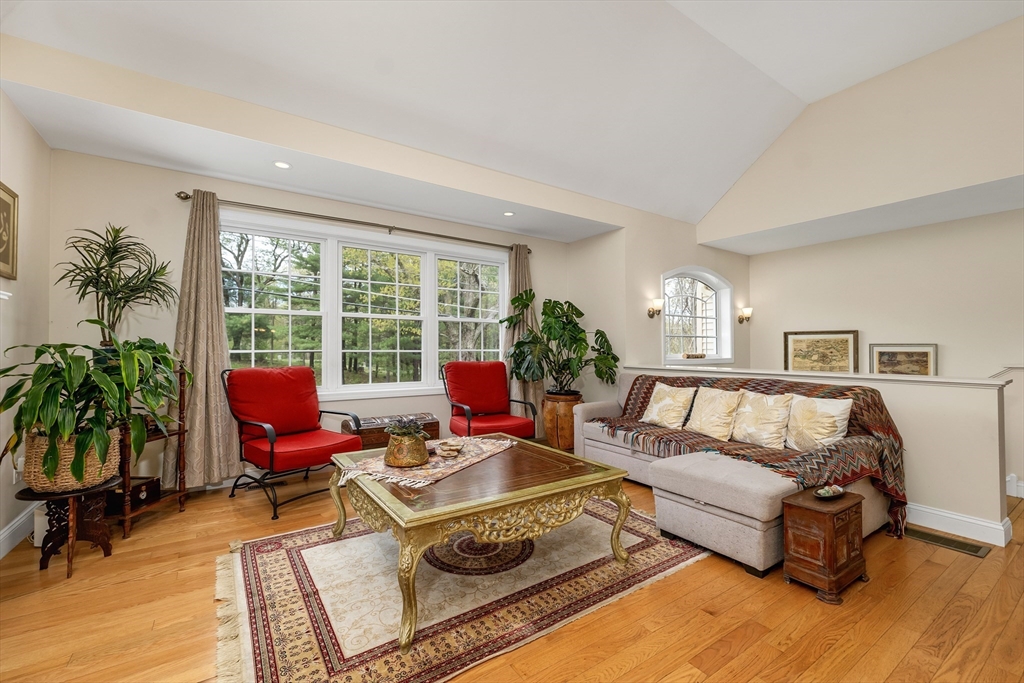 31 Danville Road Hampstead, NH 03826 - Photo 12 of 42 a living room with furniture and a large window