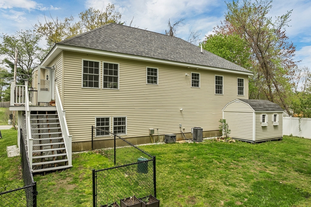 31 Danville Road Hampstead, NH 03826 - Photo 18 of 42 a front view of house with yard