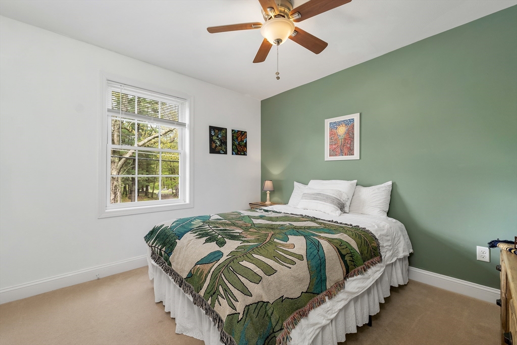 31 Danville Road Hampstead, NH 03826 - Photo 28 of 42 a bedroom with bed and a window