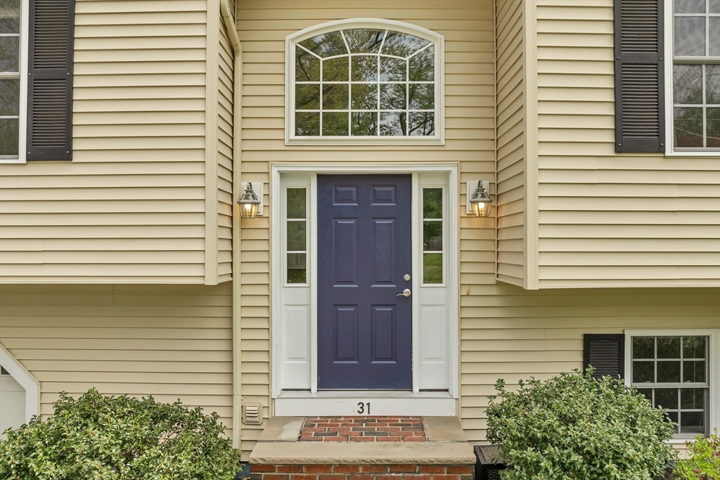 31 Danville Road Hampstead, NH 03826 - Photo 31 of 42 a front view of a house with a balcony