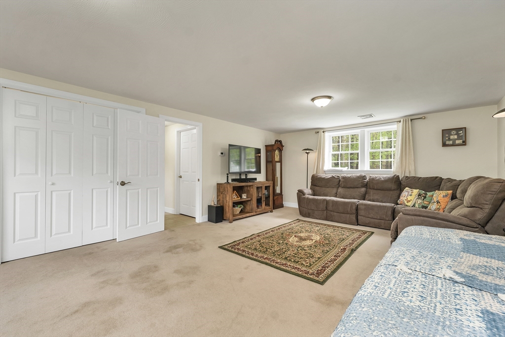 31 Danville Road Hampstead, NH 03826 - Photo 34 of 42 a living room with furniture rug and window