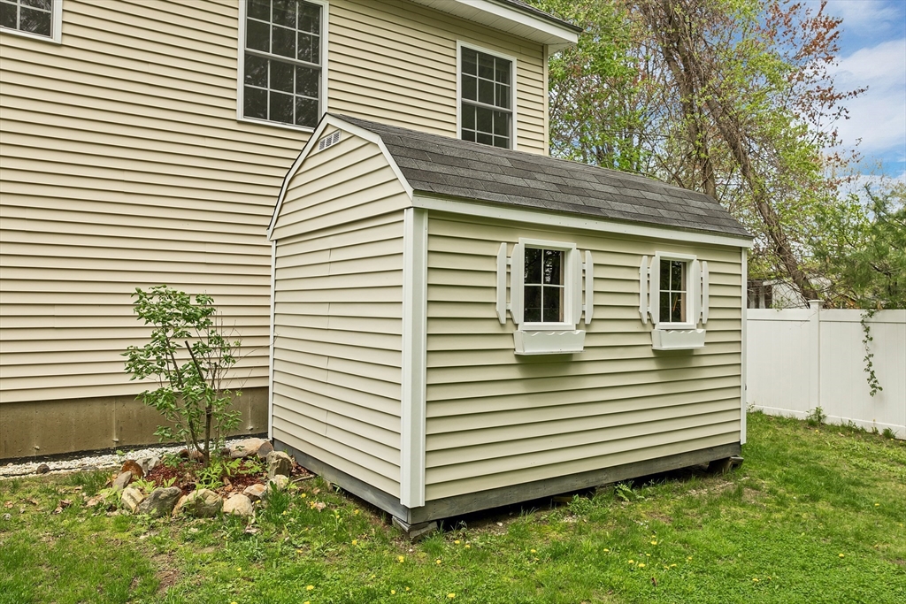 31 Danville Road Hampstead, NH 03826 - Photo 39 of 42 a view of a house with a yard and a large window