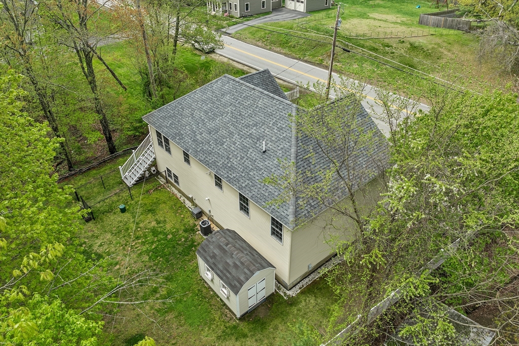 31 Danville Road Hampstead, NH 03826 - Photo 40 of 42 a view of a yard with potted plants