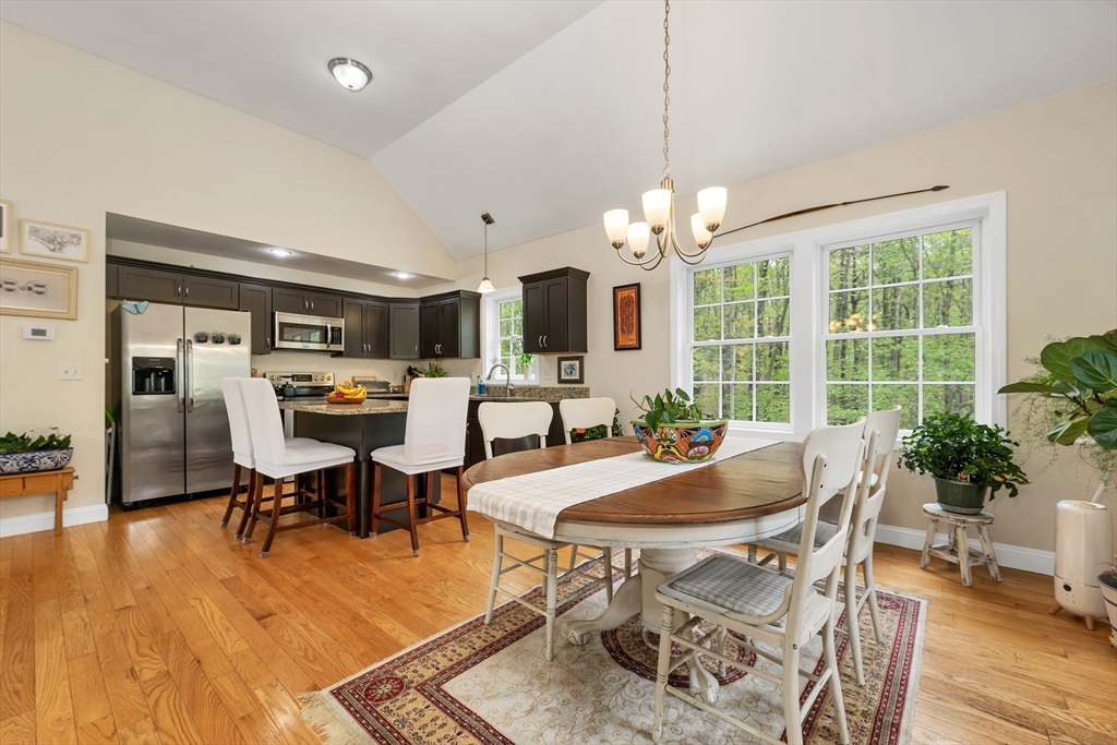 31 Danville Road Hampstead, NH 03826 - Photo 8 of 42 a view of a dining room with furniture window and wooden floor