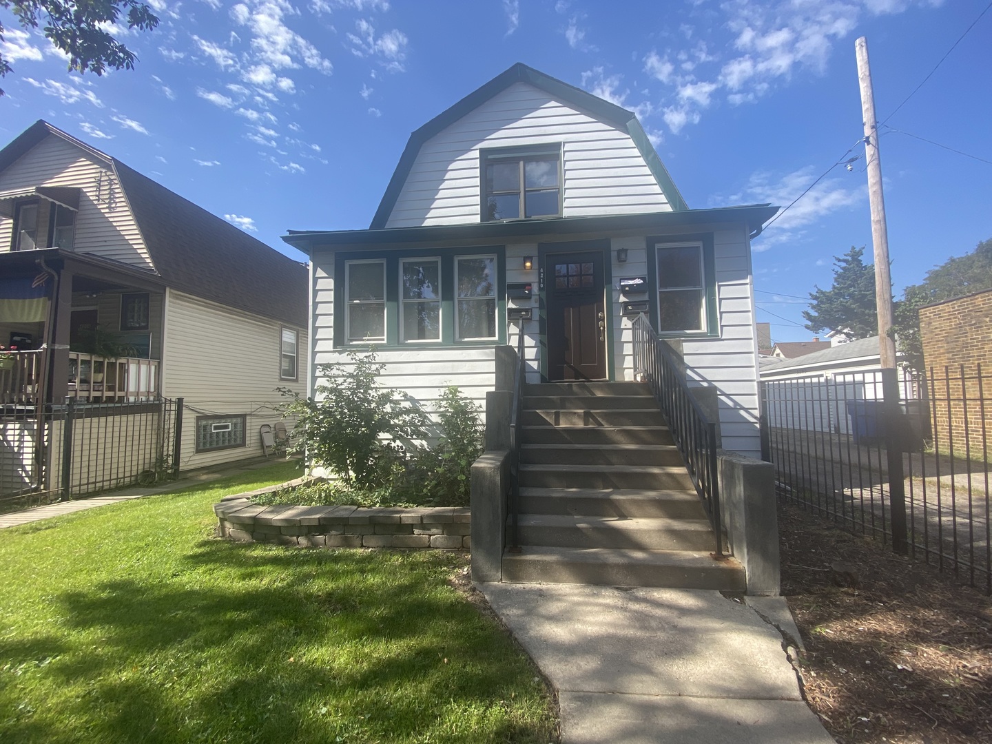 4210 North Kilpatrick Avenue, Unit 2F Chicago, IL 60641 - Photo 2 of 15 a view of a house with a yard porch and sitting area