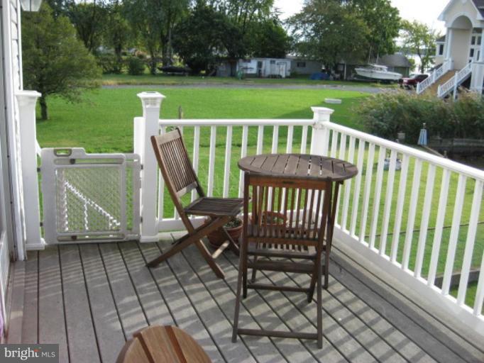 3526 Galloway Road Middle River, MD 21220 - Photo 9 of 12 a view of a deck with a table and chairs