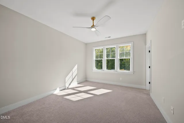 a bathroom with a sink toilet a mirror and shower