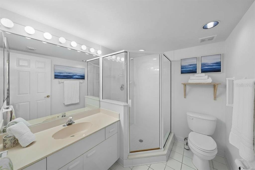 4575 South Atlantic Avenue, Unit 6209 Ponce Inlet, FL 32127 - Photo 22 of 31 a bathroom with a sink a toilet and shower
