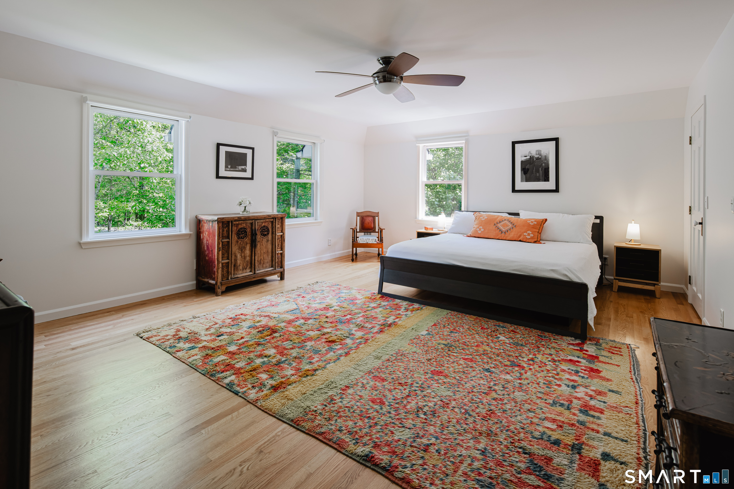 3 Partridge Trail Sherman, CT 06784 - Photo 26 of 37 a bedroom with a bed and wooden floor