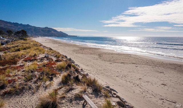 a view of beach and ocean