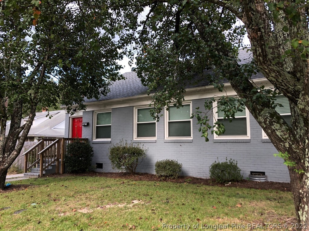700 Ann Street Rockingham, NC 28379 - Photo 4 of 19 front view of a house with a yard