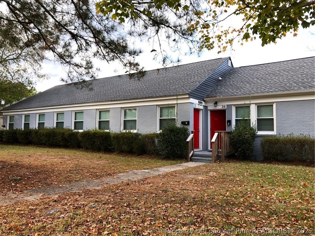 700 Ann Street Rockingham, NC 28379 - Photo 6 of 19 a view of a house with a yard