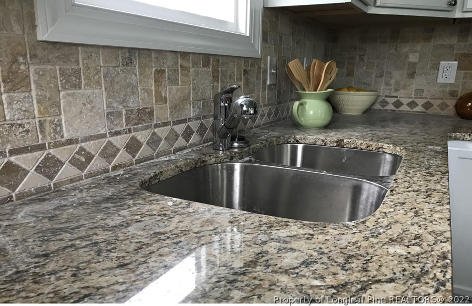 700 Ann Street Rockingham, NC 28379 - Photo 8 of 19 a view of a sink a counter top space