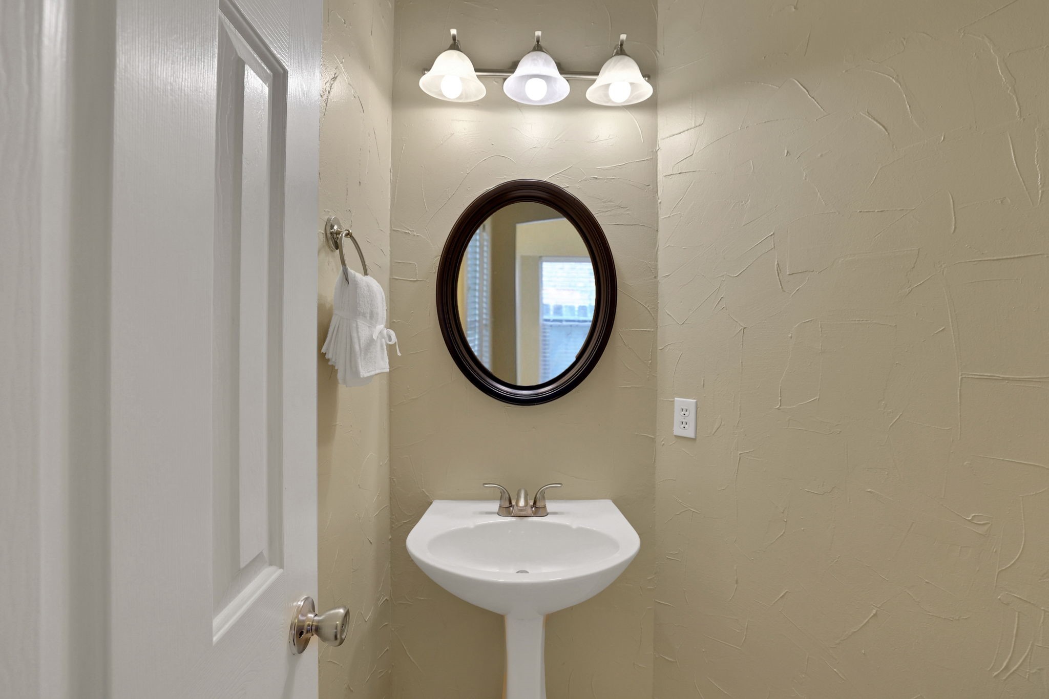 23207 Olive Ridge Court Katy, TX 77494 - Photo 18 of 46 a bathroom with a sink and a mirror