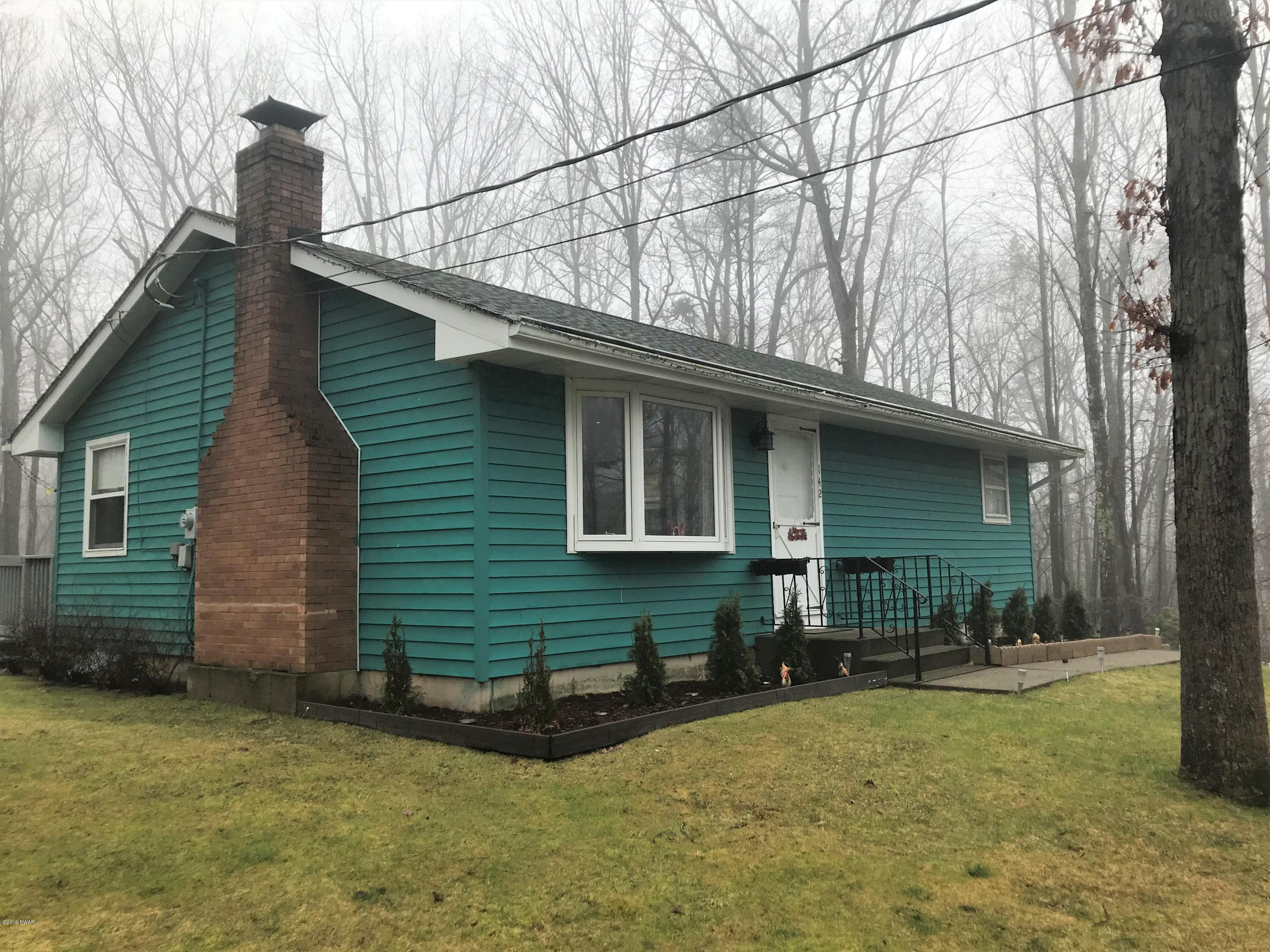 142 Kiel Road Milford, PA 18337 - Photo 2 of 34 a view of a house with a yard and sitting area