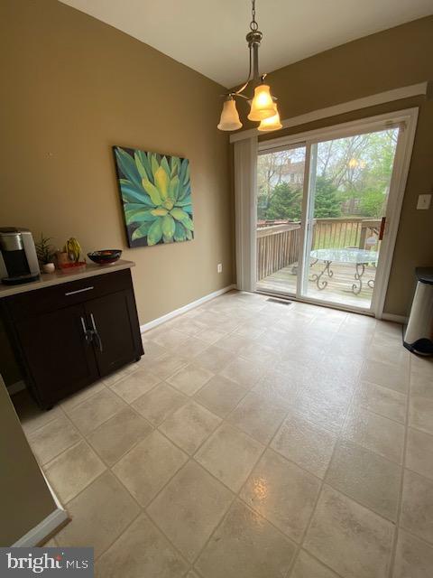 360 Snyder Lane Culpeper, VA 22701 - Photo 3 of 8 a spacious bedroom with a bed and a flat screen tv