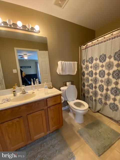 360 Snyder Lane Culpeper, VA 22701 - Photo 6 of 8 a bathroom with a sink mirror vanity and toilet