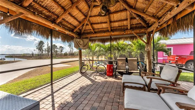 a view of swimming pool with a patio