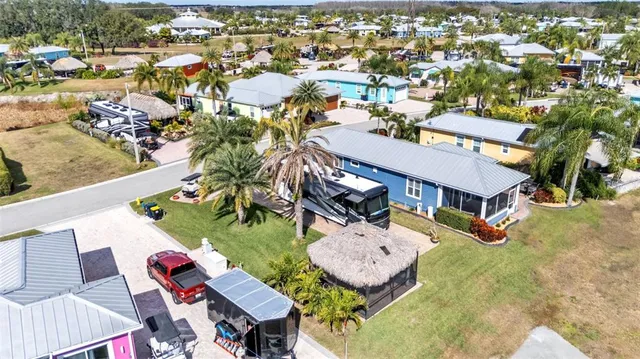 an aerial view of a house with outdoor space