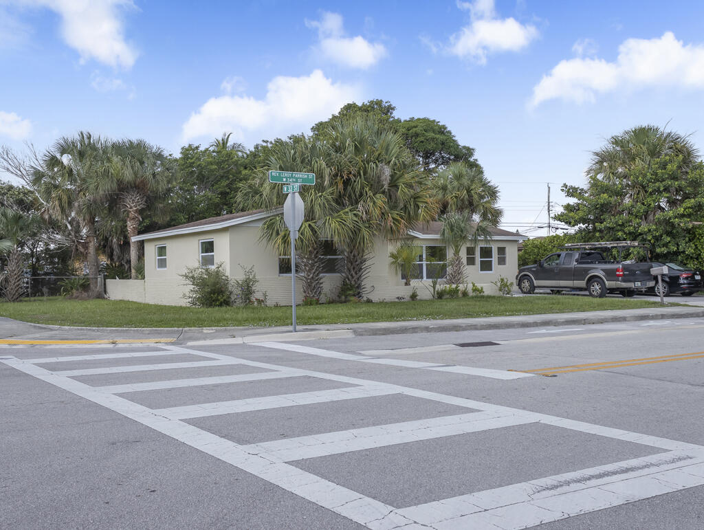 371 West 34th Street Riviera Beach, FL 33404 - Photo 1 of 27 Front