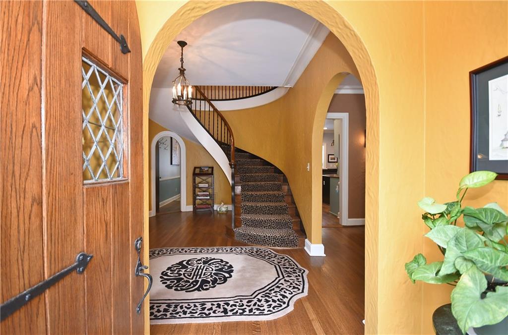 715 Delafield Road Pittsburgh, PA 15215 - Photo 2 of 25 Arched doorways lead into grand entry.