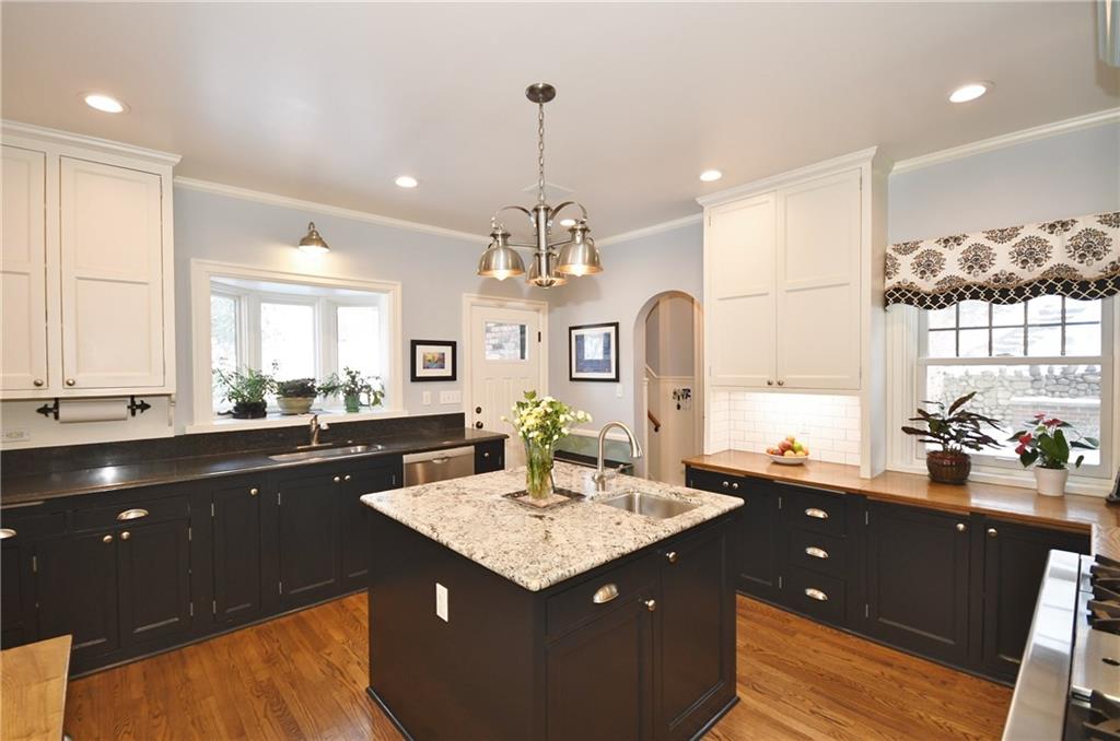 715 Delafield Road Pittsburgh, PA 15215 - Photo 9 of 25 Mix of original and newer cabinets create an authentic feel.