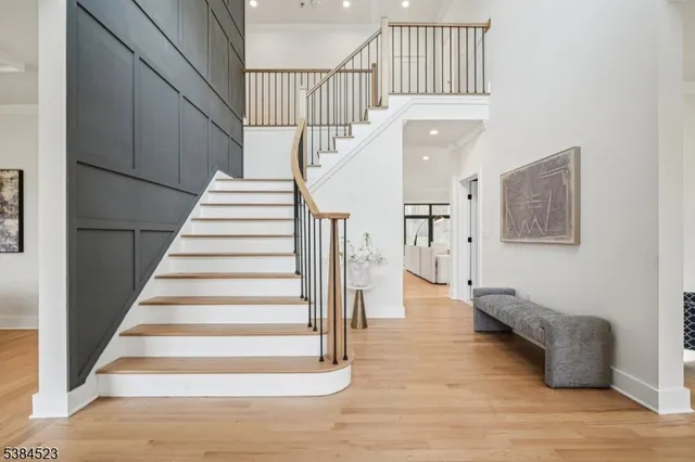a kitchen with kitchen island a sink stainless steel appliances and cabinets