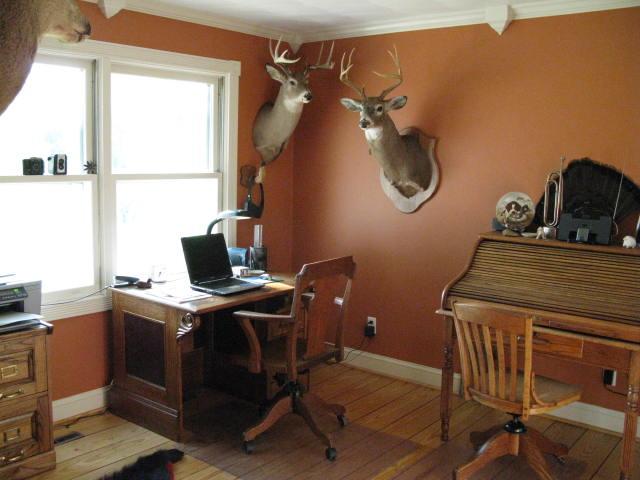 1383 Johnson School Road Thaxton, VA 24174 - Photo 12 of 22 a view of a workspace with furniture and a window