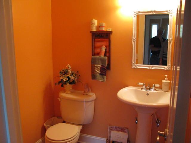 1383 Johnson School Road Thaxton, VA 24174 - Photo 13 of 22 a bathroom with a toilet sink and mirror