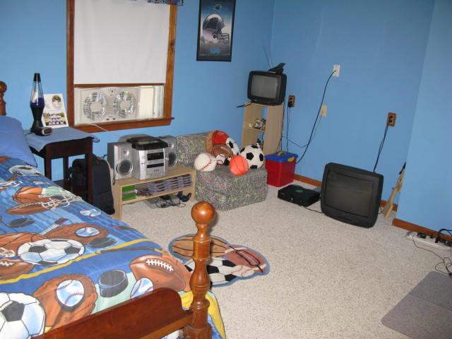 1383 Johnson School Road Thaxton, VA 24174 - Photo 18 of 22 a bedroom with furniture and a mirror