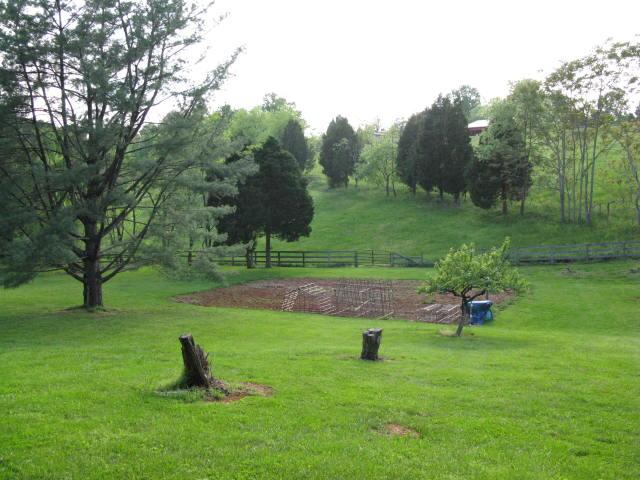 1383 Johnson School Road Thaxton, VA 24174 - Photo 4 of 22 a view of a garden with a lake