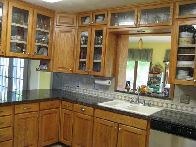 1383 Johnson School Road Thaxton, VA 24174 - Photo 5 of 22 a kitchen with stainless steel appliances granite countertop a sink and cabinets