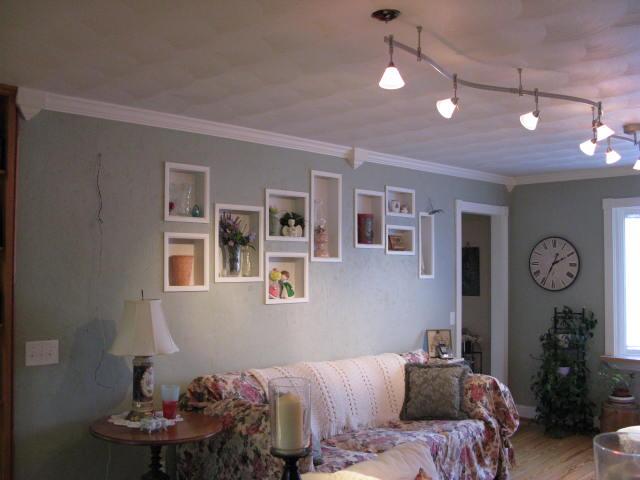 1383 Johnson School Road Thaxton, VA 24174 - Photo 8 of 22 a bedroom with a bed chandelier and a window