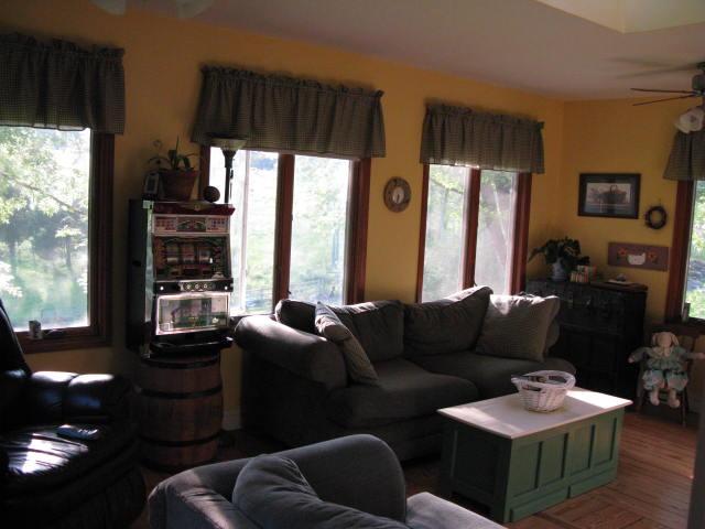 1383 Johnson School Road Thaxton, VA 24174 - Photo 10 of 22 a living room with furniture and a large window