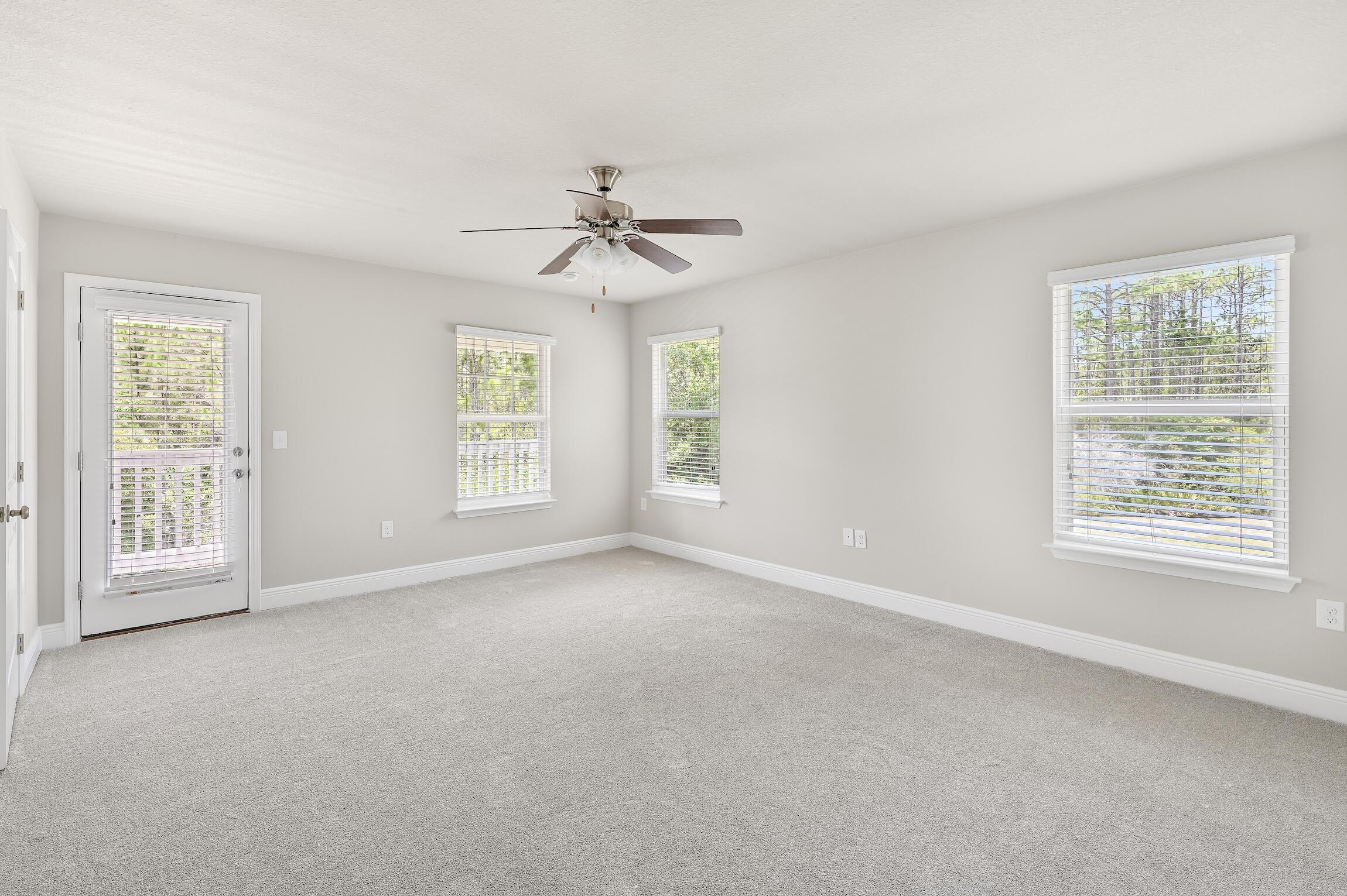 74 Tranquility Lane Santa Rosa Beach, FL 32459 - Photo 21 of 49 a view of an empty room with a window