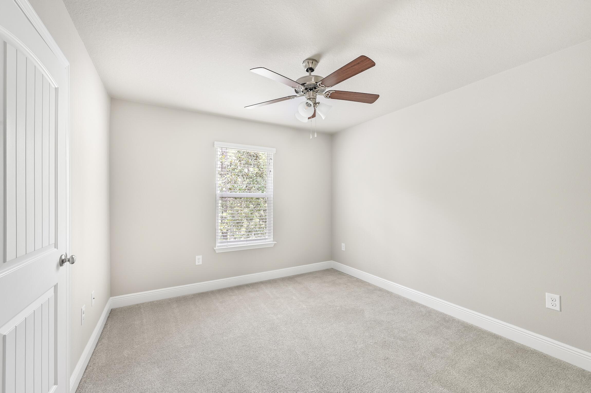 74 Tranquility Lane Santa Rosa Beach, FL 32459 - Photo 31 of 49 a view of an empty room with a window