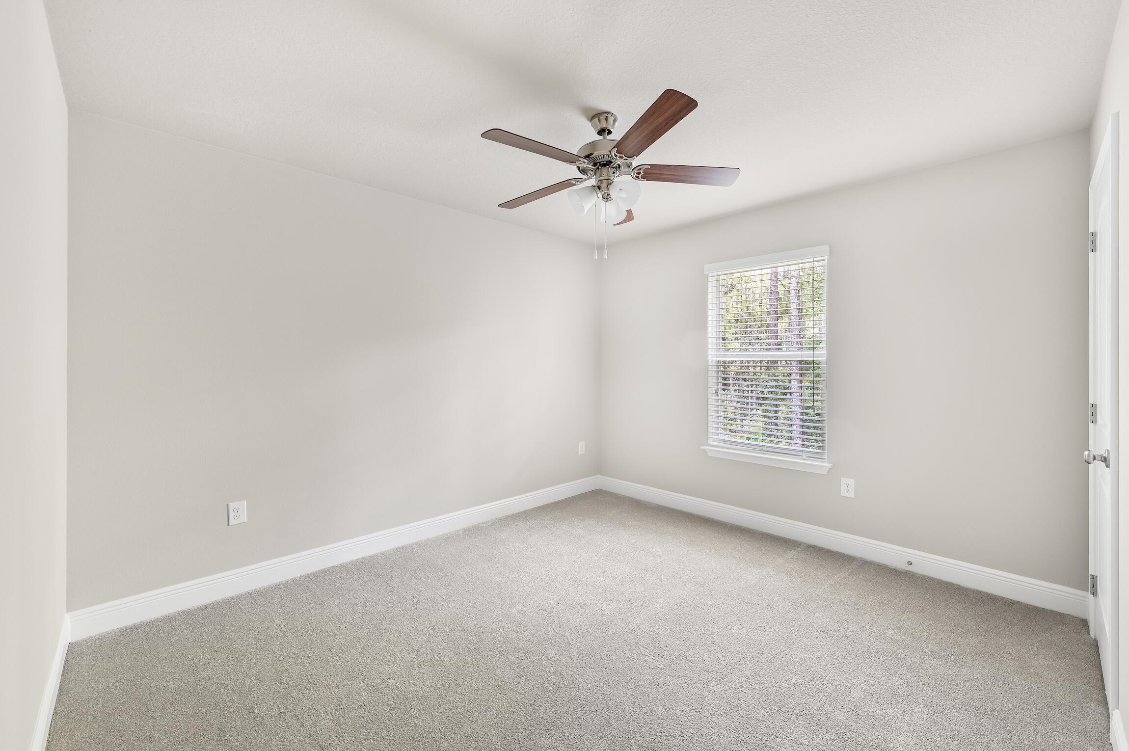 74 Tranquility Lane Santa Rosa Beach, FL 32459 - Photo 32 of 49 an empty room with a window