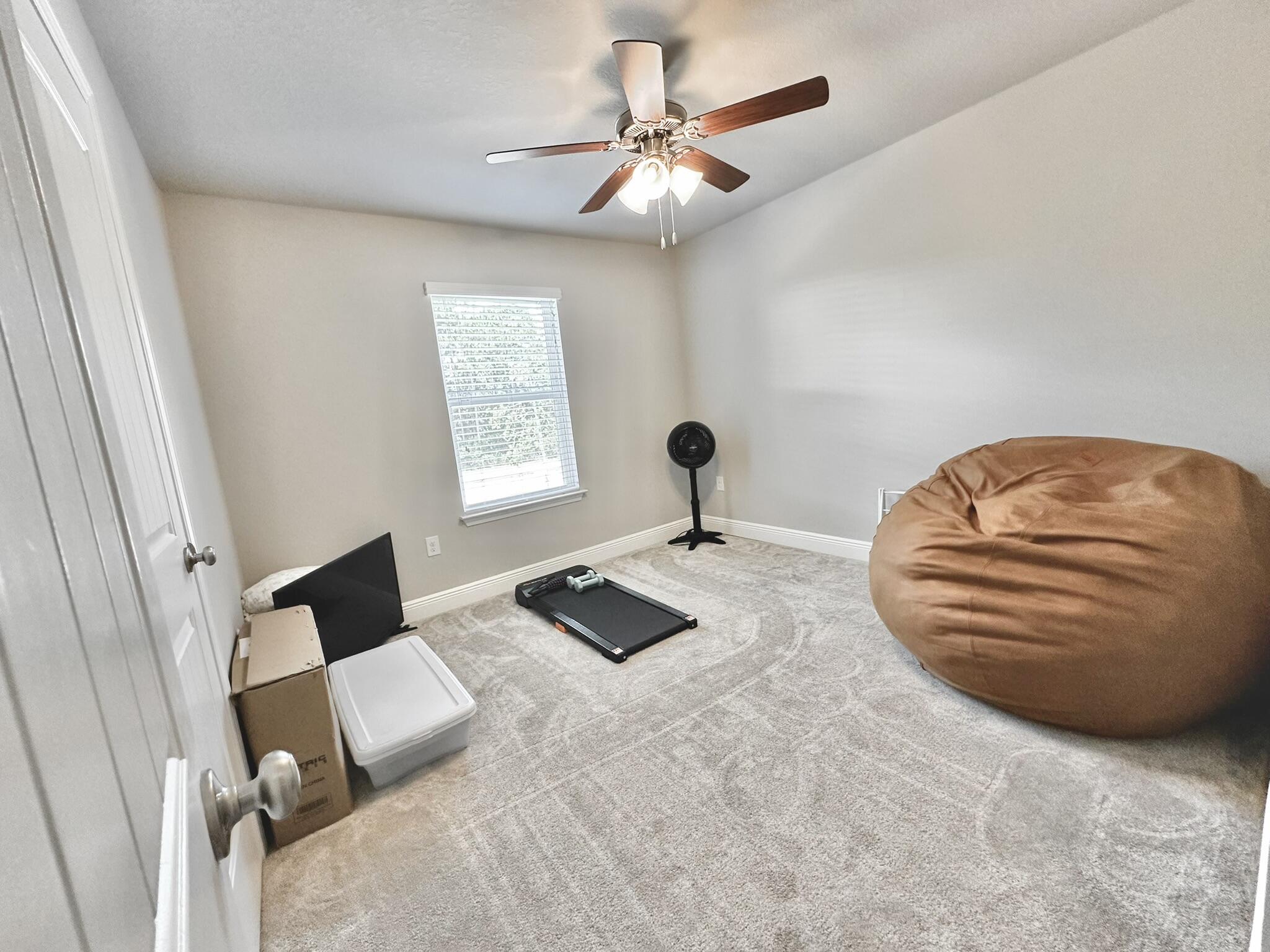 74 Tranquility Lane Santa Rosa Beach, FL 32459 - Photo 33 of 49 a bedroom with a bed and a chandelier