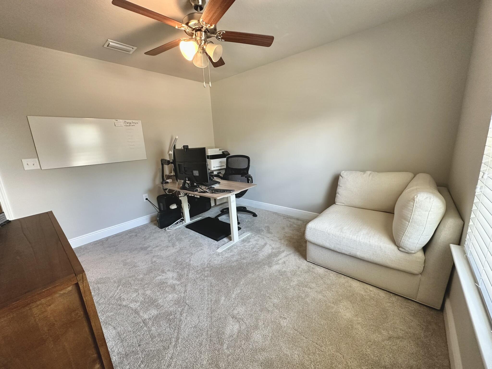 74 Tranquility Lane Santa Rosa Beach, FL 32459 - Photo 35 of 49 a living room with furniture and a chandelier