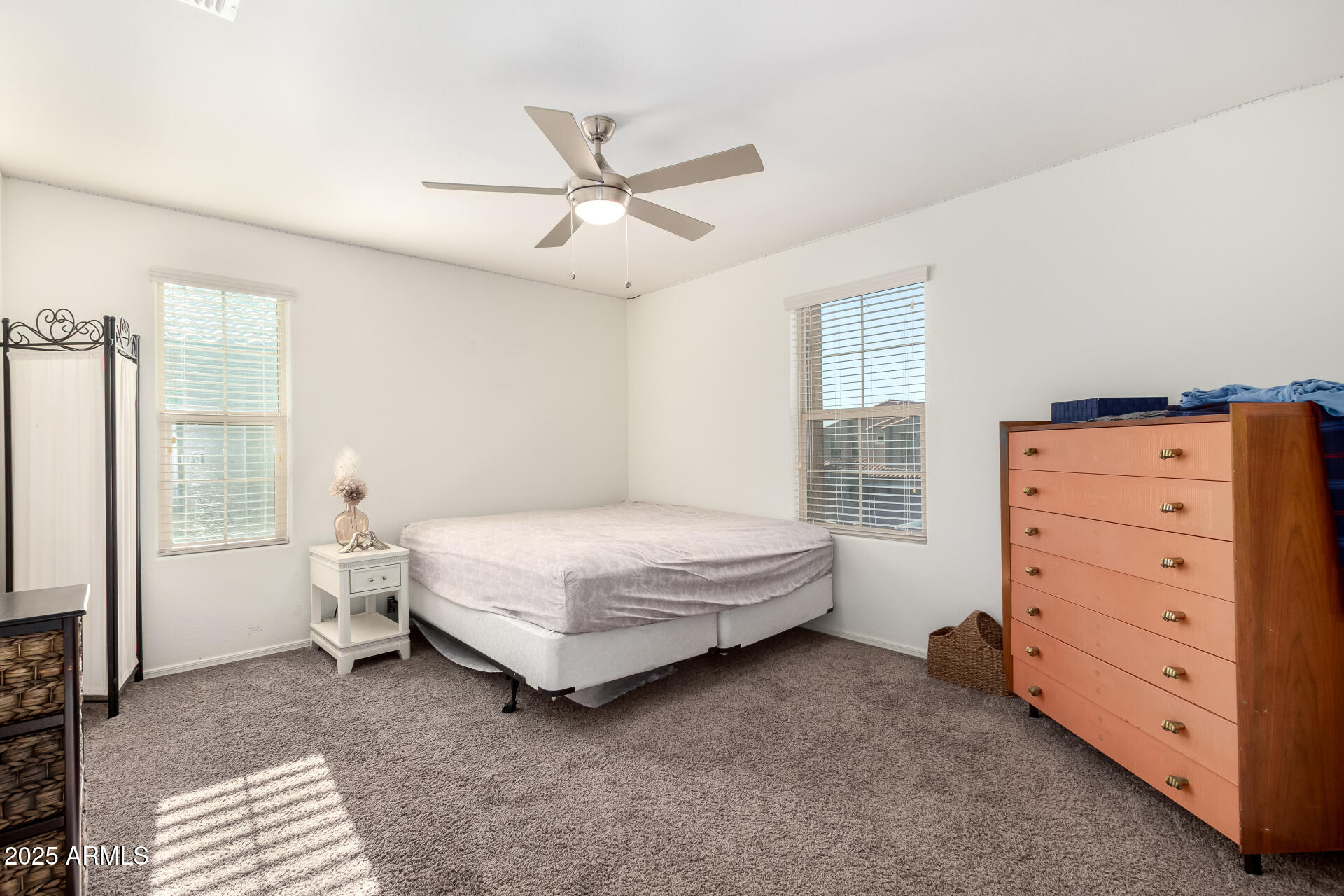 2665 East Gillcrest Road Gilbert, AZ 85298 - Photo 27 of 48 a bedroom with a bed and a cabinets