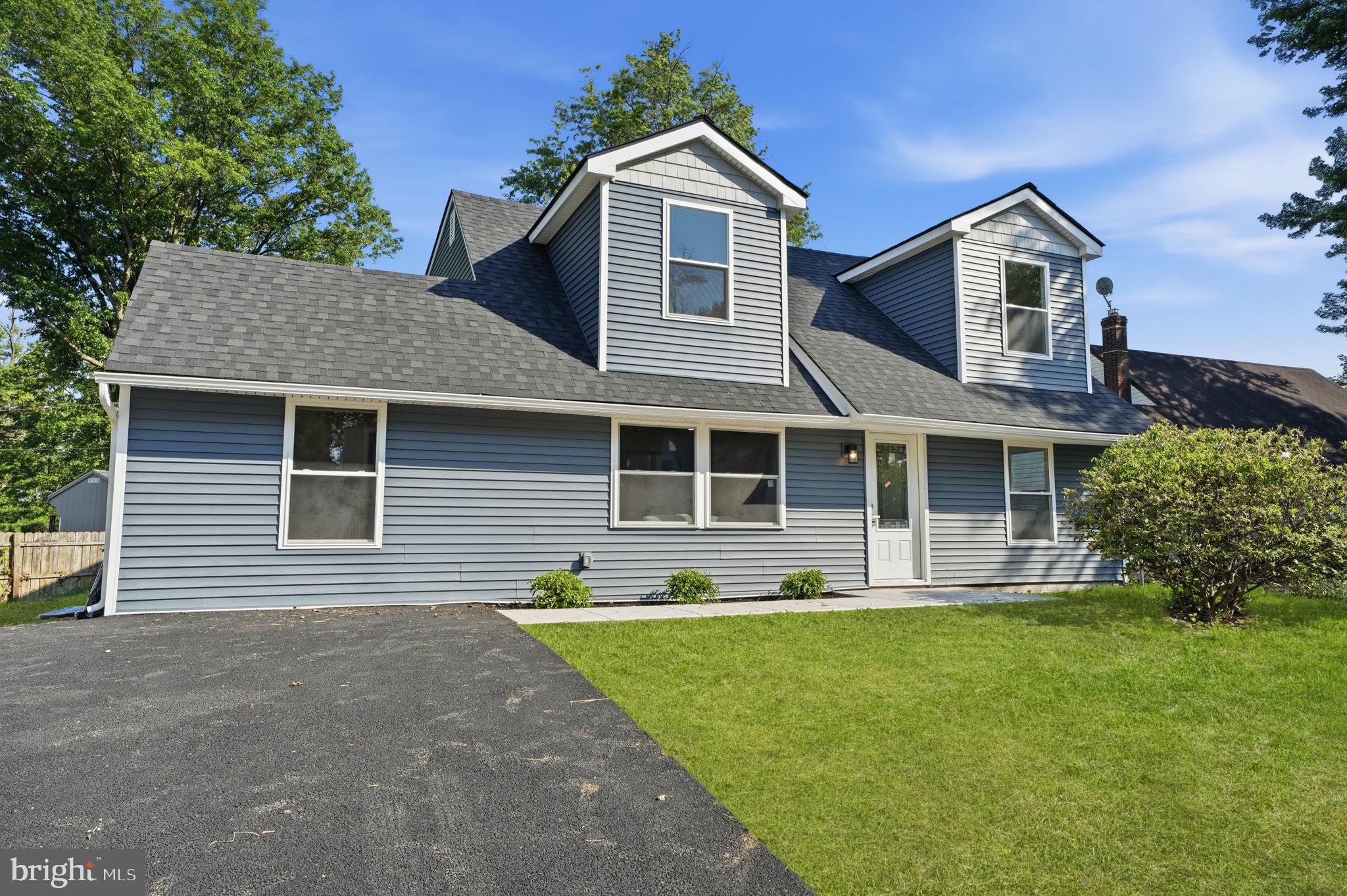 22 Peppermint Road Levittown, PA 19056 - Photo 32 of 42 Grass is virtual due to new seeding at the home