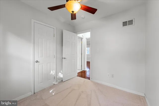 en empty room with windows