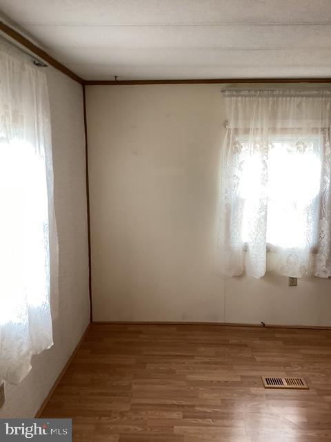 18 Spruce Drive Sicklerville, NJ 08081 - Photo 14 of 20 a view of wooden floor and windows in a room