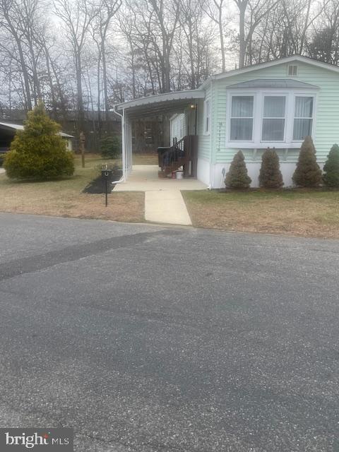 18 Spruce Drive Sicklerville, NJ 08081 - Photo 2 of 20 a front view of a house with a yard and garage