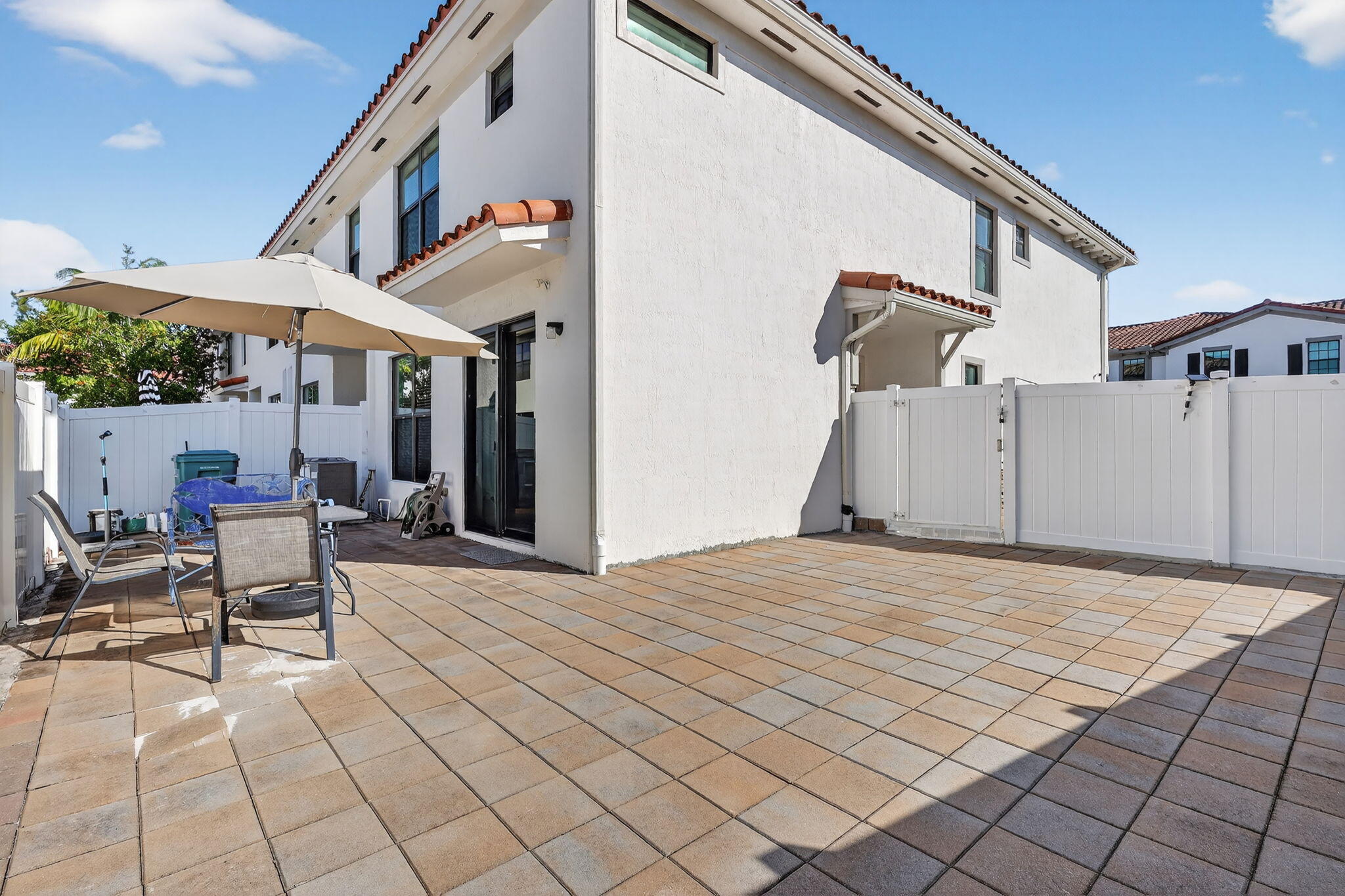 1011 Willow Place Riviera Beach, FL 33410 - Photo 17 of 65 a house view with a outdoor space