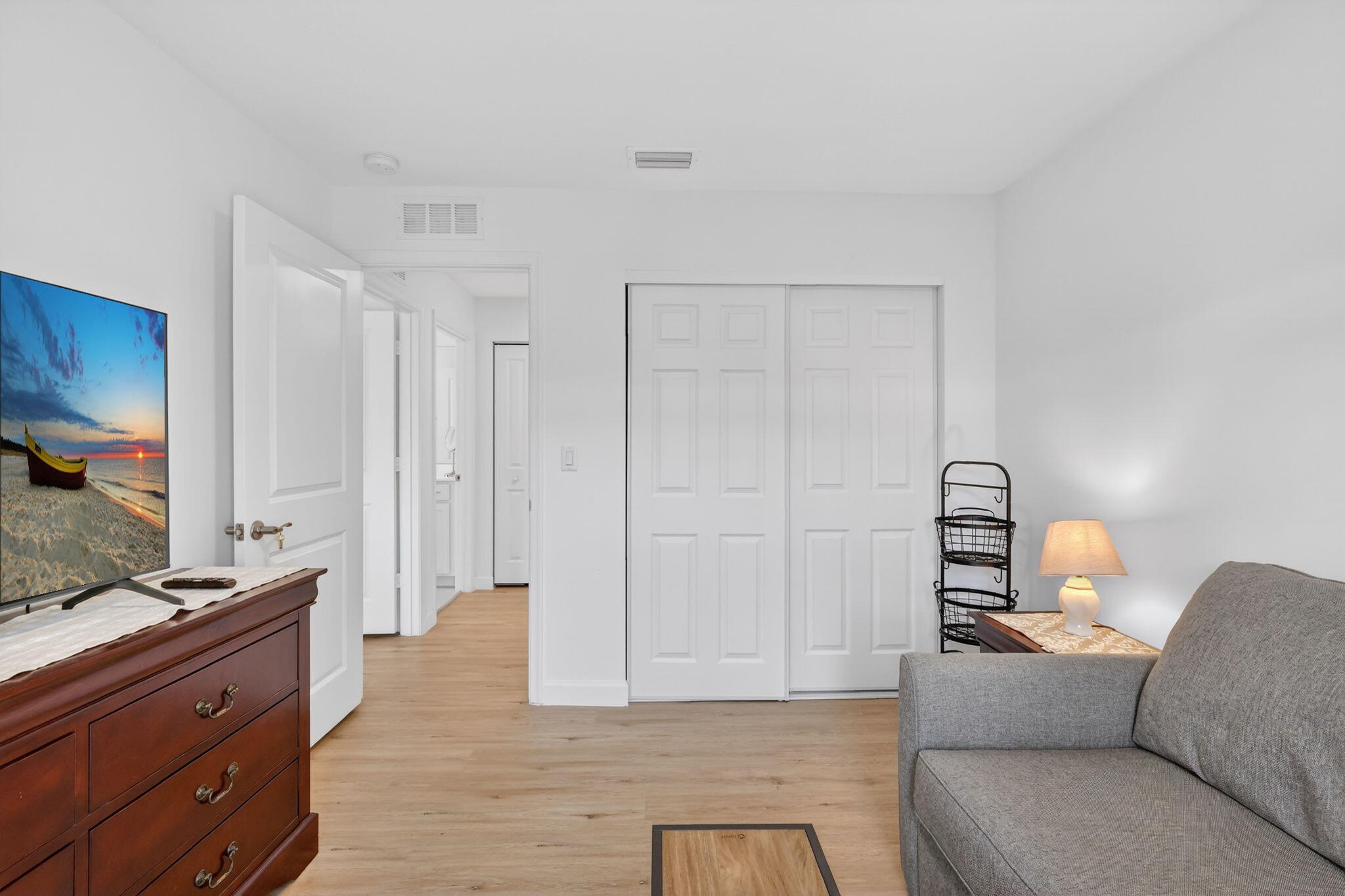 1011 Willow Place Riviera Beach, FL 33410 - Photo 26 of 65 a living room with furniture and a flat screen tv
